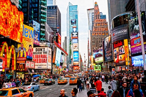 NEW YORK CITY -MARCH 25: Times Square, featured with Broadway Theaters and animated LED signs, is a symbol of New York City and the United States, March 25, 2012 in Manhattan, New York City@ credit Depositphotos