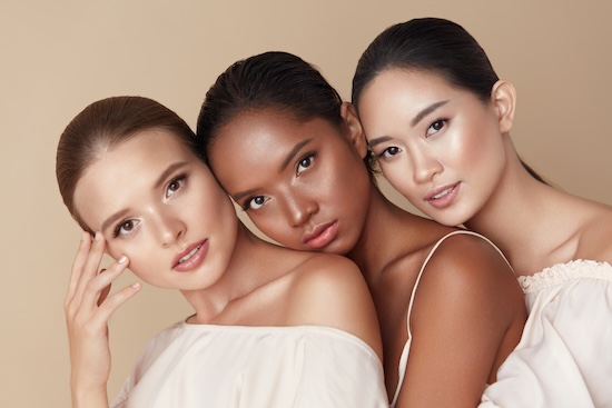 Beauty. Group Of Diversity Models Portrait. Multi-Ethnic Women With Different Skin Types Posing On Beige Background. Tender Multicultural Girls Standing Together And Looking At Camera @ credit Depositphotos