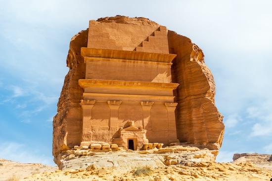 Entrance to the Tomb of Lihyan, son of Kuza carved in rock in the desert, Mada'in Salih, Hegra, Saudi Arabia @ credit Depositphotos