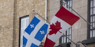 Innovation, Social | Le Québec, nouvelle destination privilégiée des étudiants guadeloupéens Flags of Quebec and Canada @ credit Depositphotos