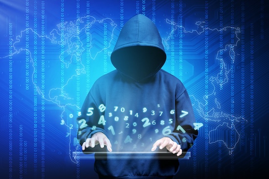 Computer hacker silhouette of hooded man @ credit Depositphotos