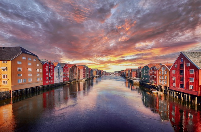 Colorful houses over water in Trondheim city - Norway @ credit Depositphotos