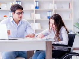 Disabled student studying and preparing for college exams