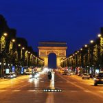 The Champs-Elysees at night in Paris, France